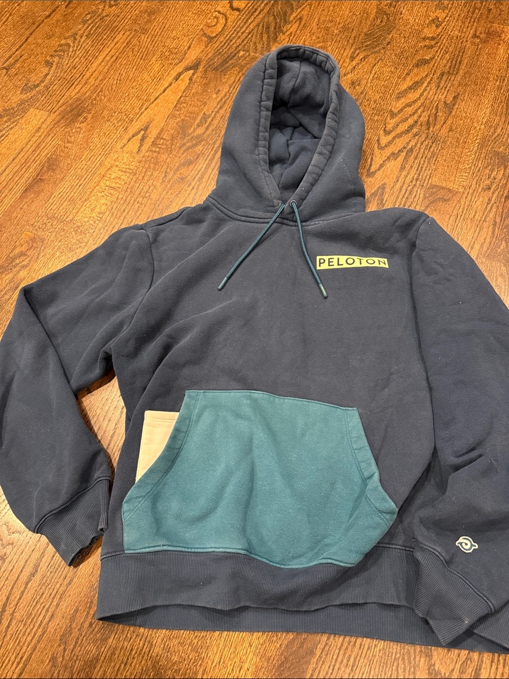 Peloton Men's Navy Crewneck Hoodie with Teal Pocket and Tan Accent